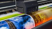 Large format printing machine in operation. Industry Digital Printing