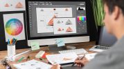 Graphic designer drawing sketches logo design. Graphic Design